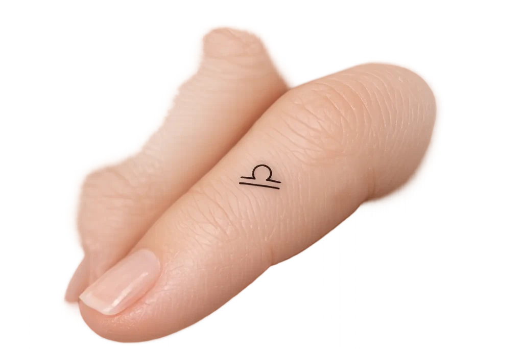 Libra Finger Tattoo