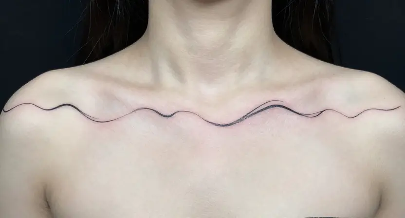 The Continuous Line Wave Tattoo