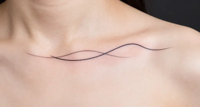 The Minimalist Wave Outline Tattoo