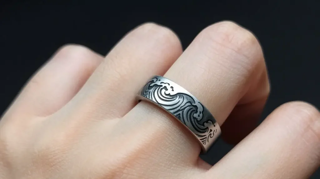 Wedding Ring Tattoo with Waves