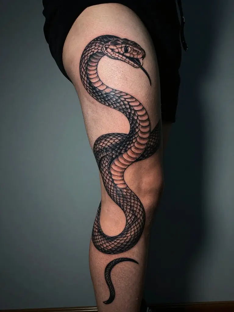 Snake and Serpent Thigh Tattoos That Wind Power and Symbolism Around the Leg