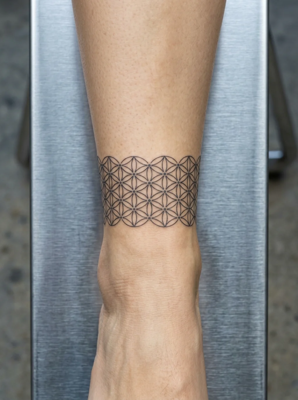 Geometric and Sacred Geometry Anklet Tattoos That Command the Barefoot Look