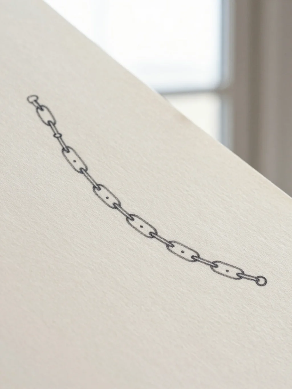 Minimalist Chain Tattoos for the Person Who Wants Permanent Subtle Elegance