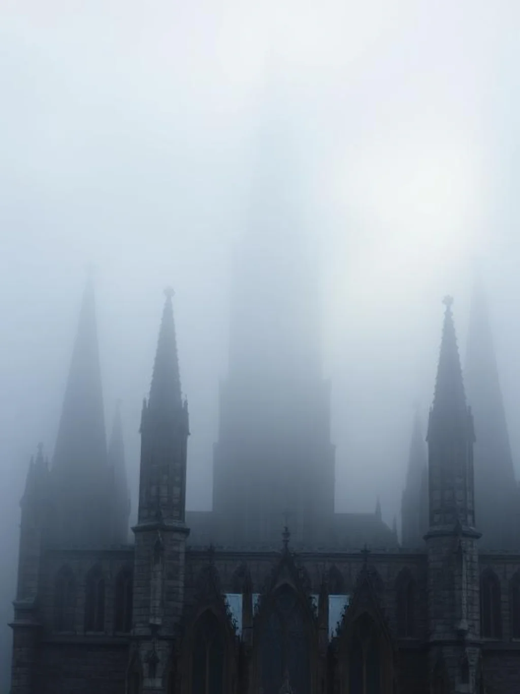 Architectural Cathedral Spires Pierce Dense Fog to Guard Scale Tattoos