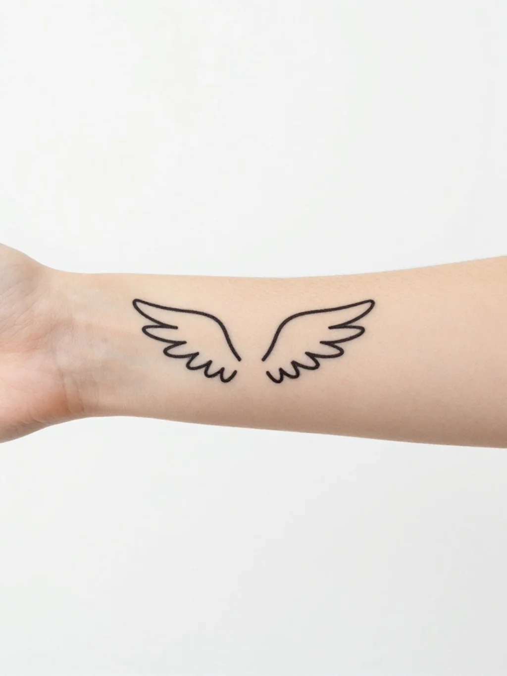 Small and Minimalist Angel Wings Tattoos That Hold Heaven in Little Space