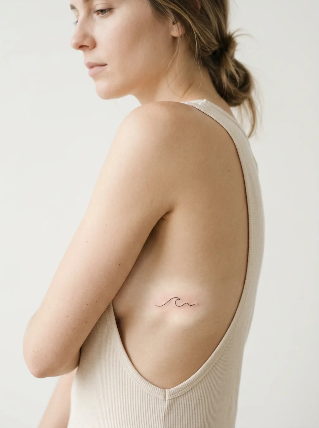 Small Rib Tattoo Ideas for Women Who Believe Less Speaks Louder