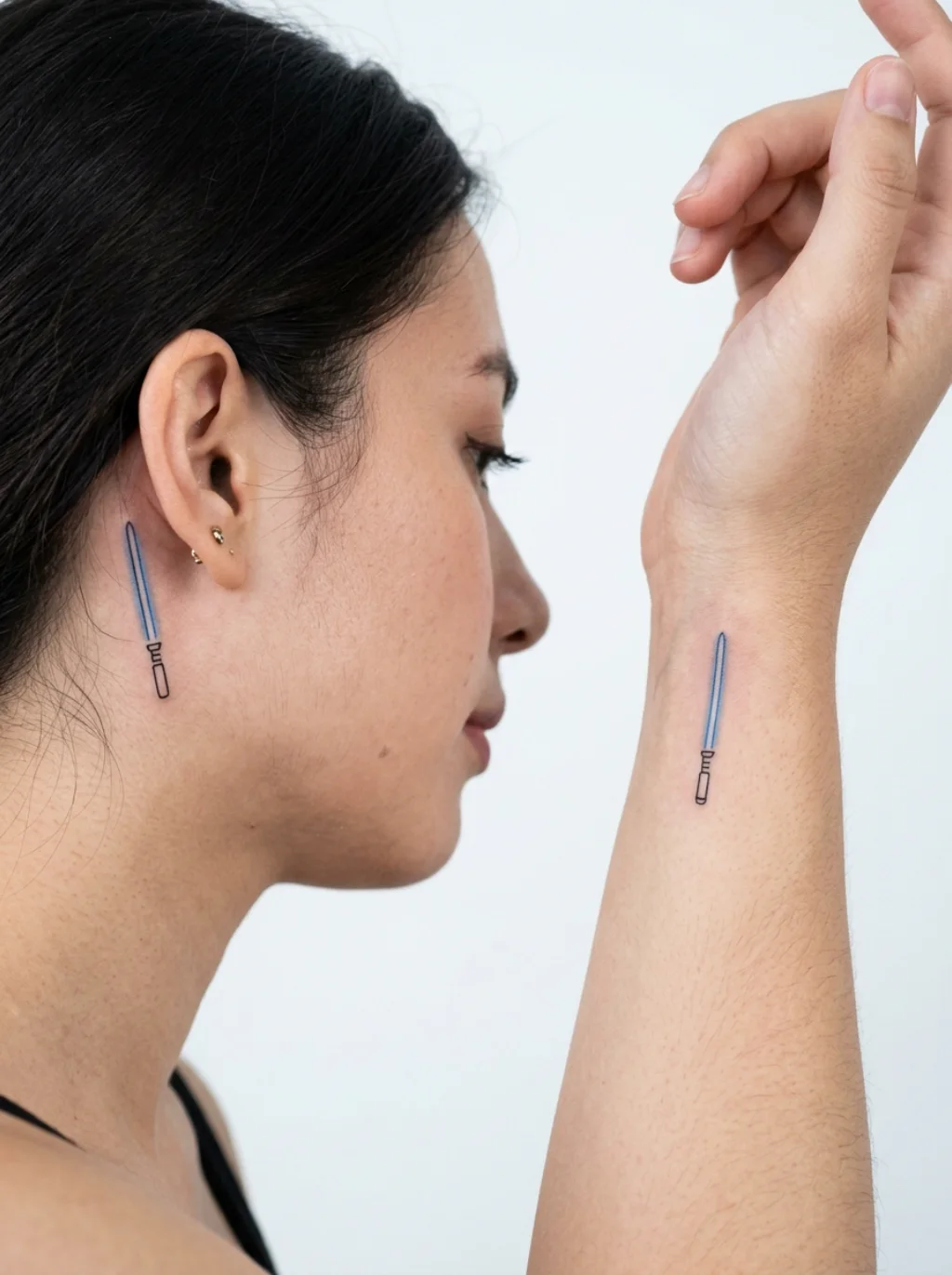 Minimalist Lightsaber Tattoos That Hold the Entire Star Wars Universe in One Line